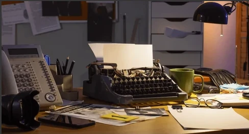 Investigator's desk with a typewriter and case notes